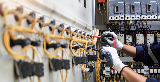 Professional Electrician technician working in Mustang Ridge, TX